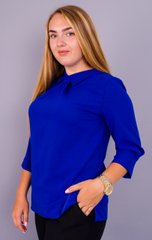 Courtney. חולצת פלאס סייז מעודנת לנשים. כחול זוהר 485130727 צילום