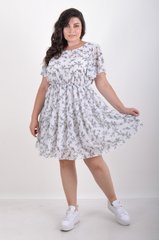 שמלת קיץ יומיומית עם שיפון. הפרח לבן .495278306 495278306 צילום